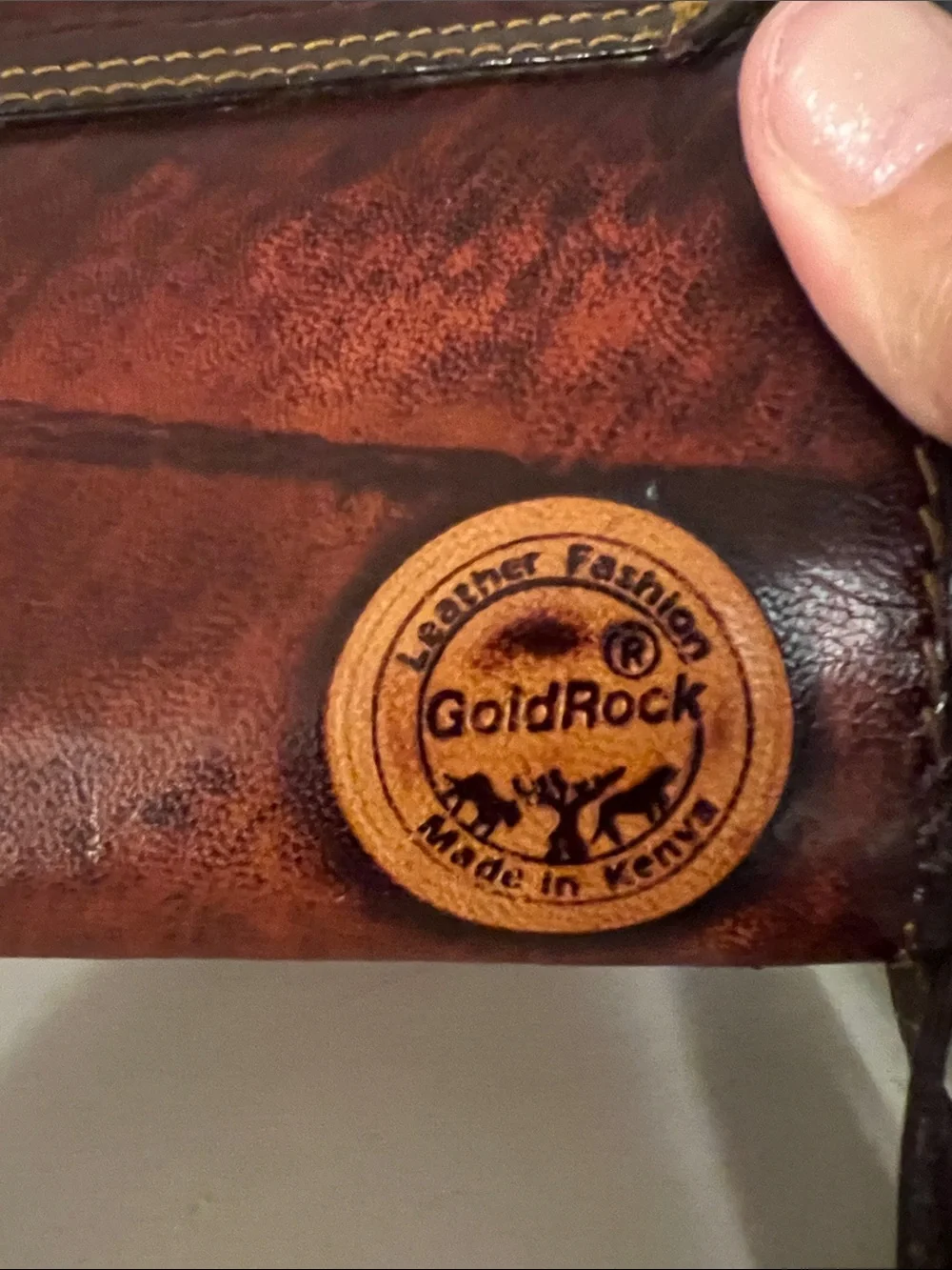 Gold Rock Brown Leather small Messenger Bag with Carved Wildlife Scene